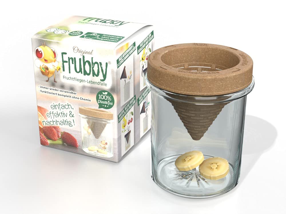 Frasco de vinagre con moscas atrapadas