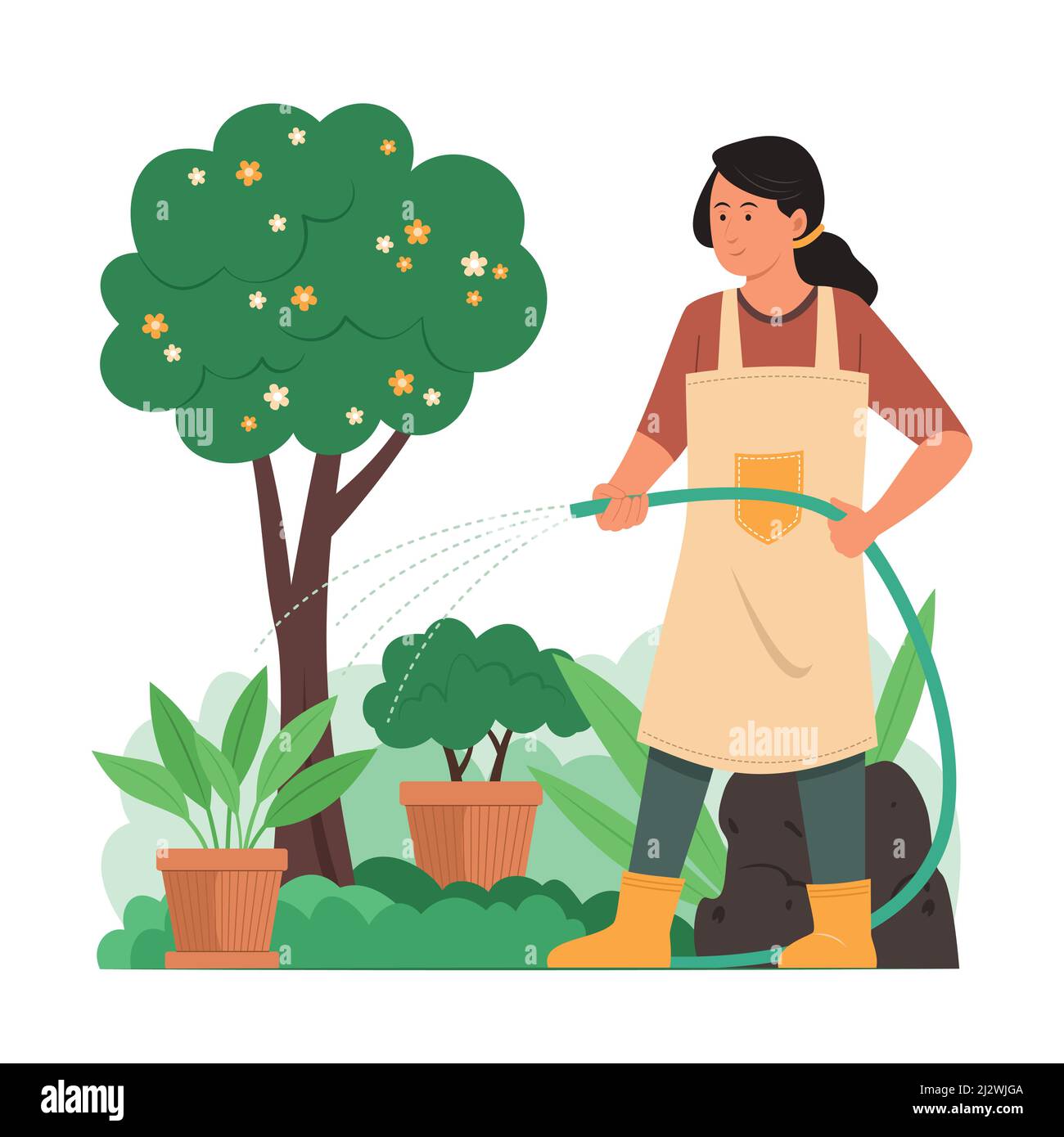 Mujer regando plantas en jardín ecológico